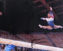 Gymnast performing on balance beam