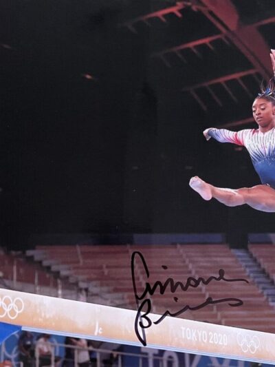 Gymnast performing on balance beam