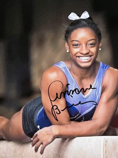 Athlete smiling on balance beam