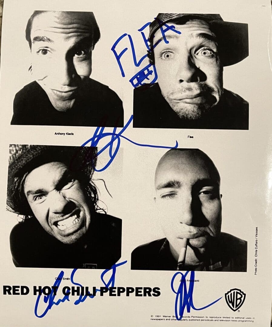Black-and-white band photo with signatures.
