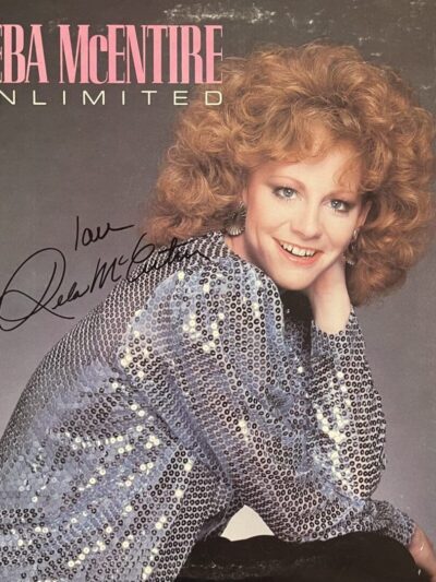 Album cover with a smiling woman.