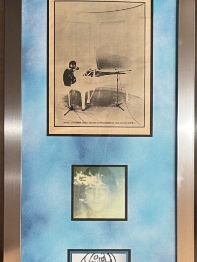 Framed collage with photos and artwork.