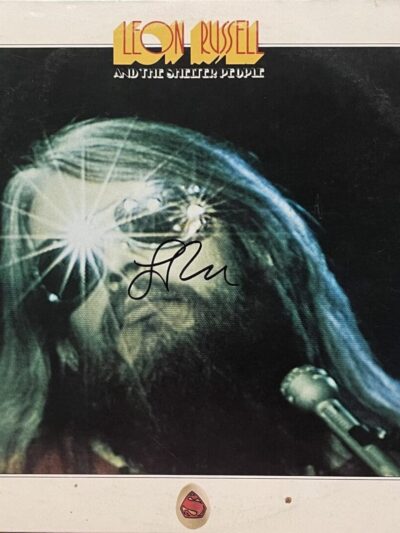 Album cover with singer and microphone.