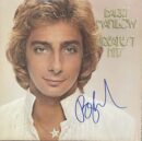 Album cover with a smiling person.
