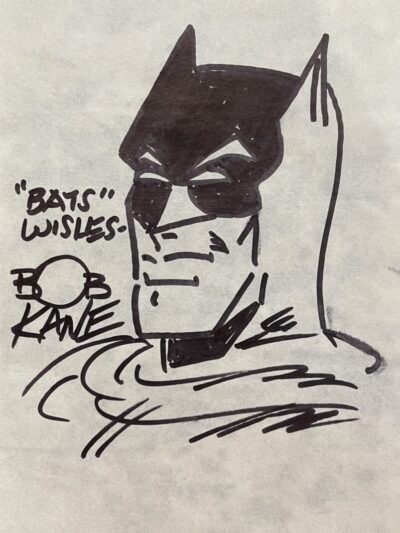 Drawing of a superhero with signature.