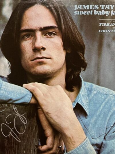 Album cover with man in denim shirt.