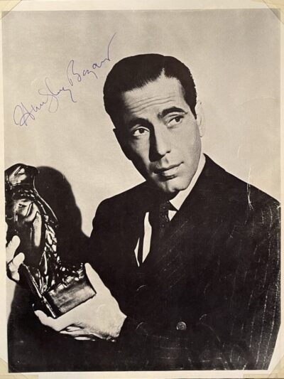 Man holding statuette