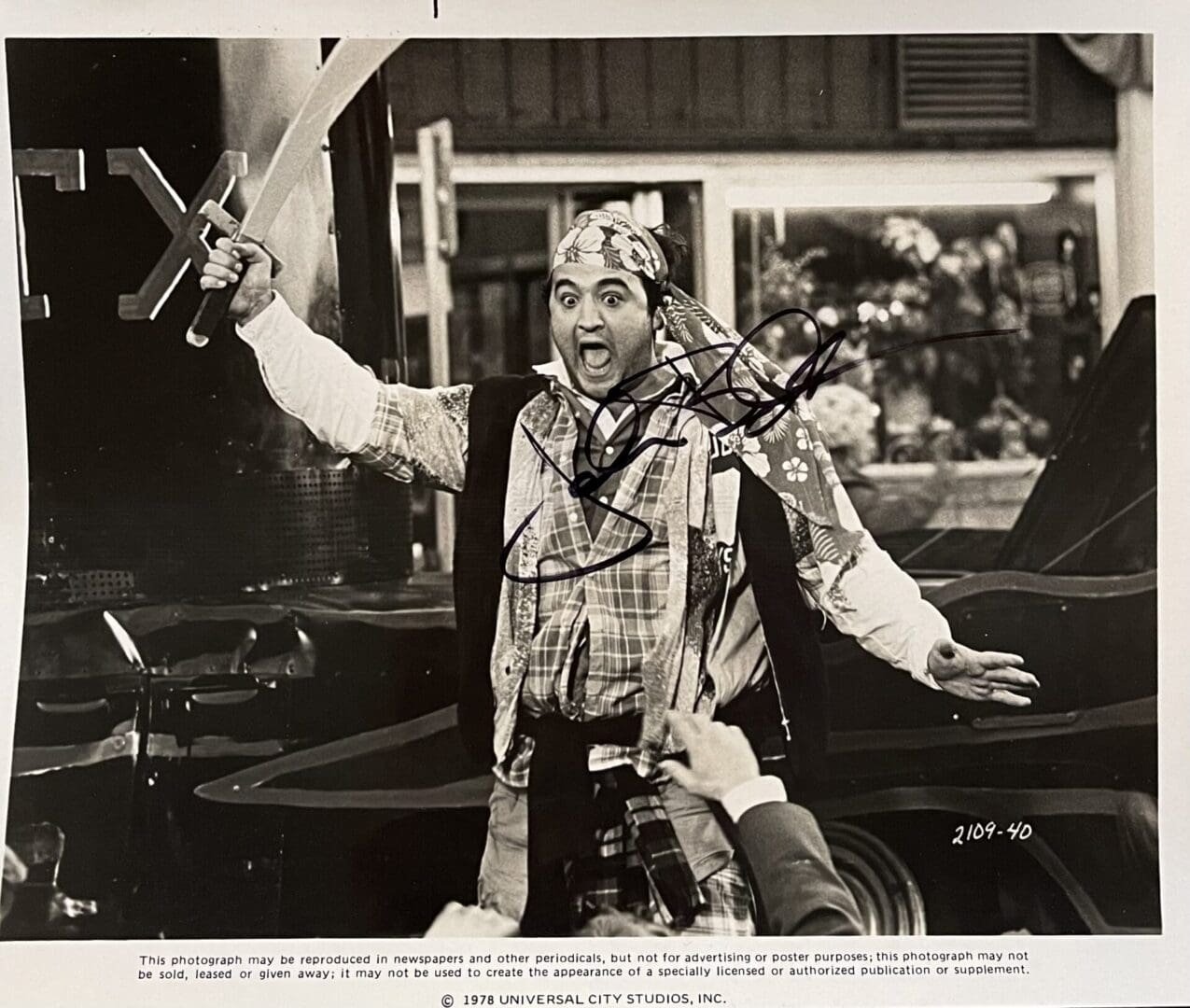 Man dressed as pirate holding sword