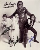 Star Wars characters posing with signatures.