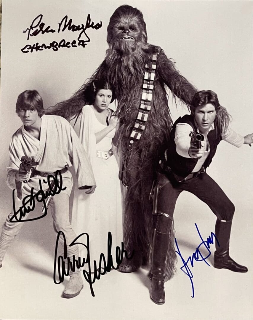 Star Wars characters posing with signatures.