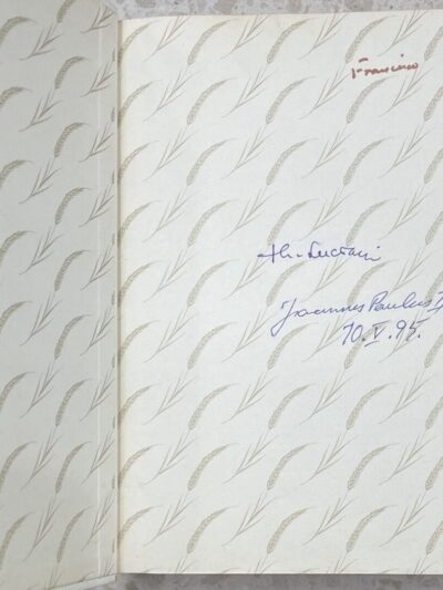 Open book with handwritten notes inside cover.