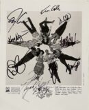 Cast photo with multiple autographs