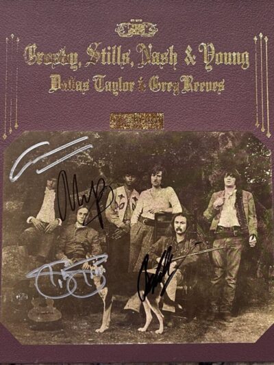 Vintage album cover with band members' autographs.