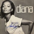 Black and white album cover with signature.