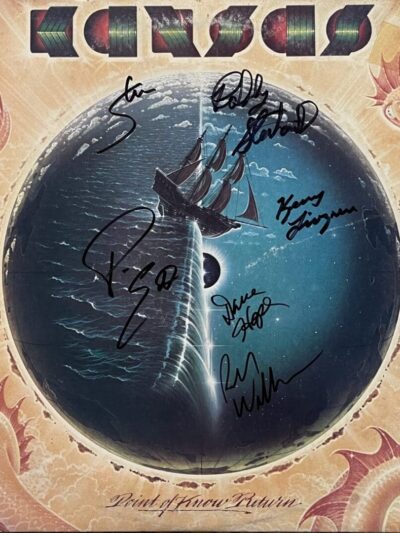 Autographed album cover with ship illustration.