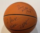 Autographed basketball with handwritten messages.