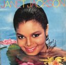 Smiling woman in water with flowers.