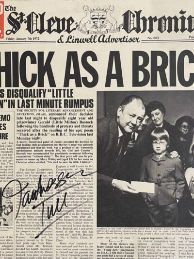Newspaper cover with group photo