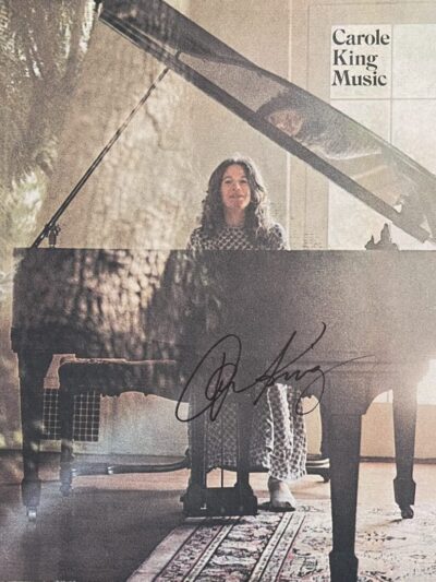 Woman playing piano in sunlit room.