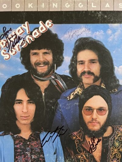 Album cover of a band with autographs.
