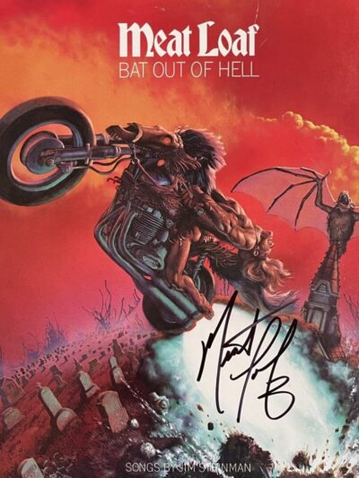 Motorcycle rider escaping fiery graveyard scene.