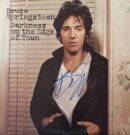 Album cover with man's autograph and signature.