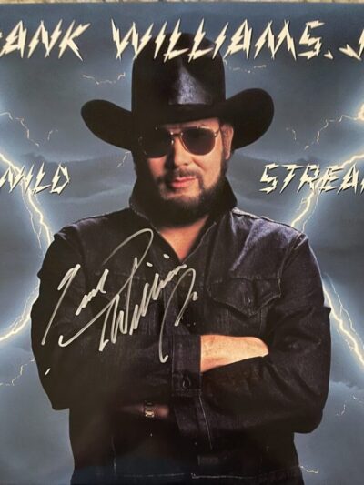 Man in black hat with lightning background.