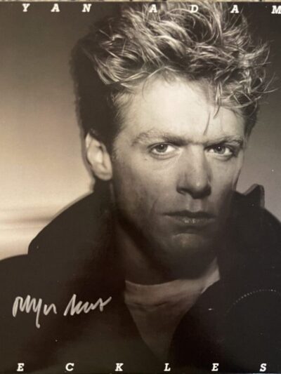 Black and white portrait of a musician.