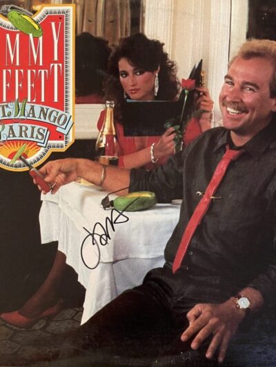 Man smiling at table with woman