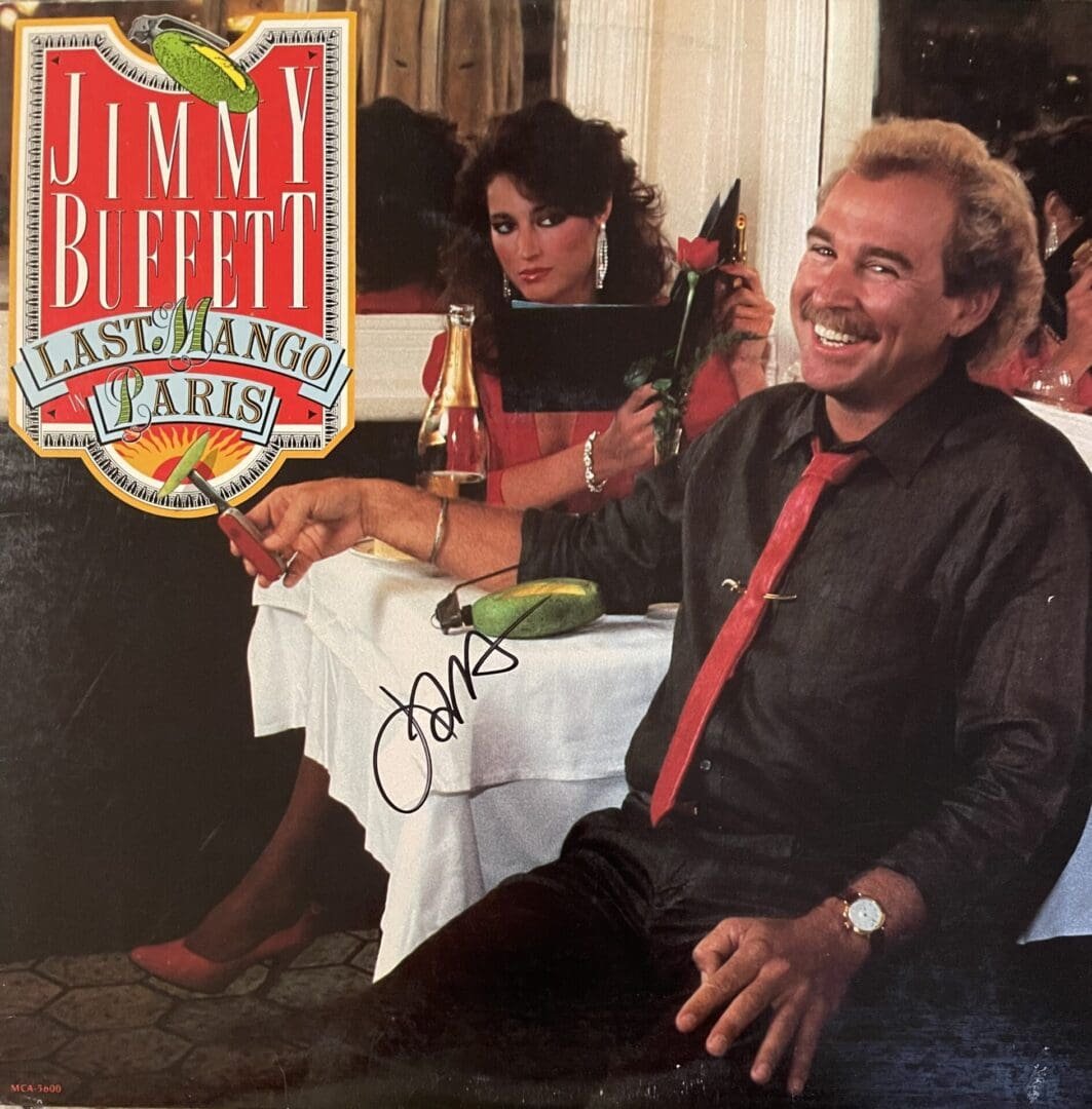 Man smiling at table with woman