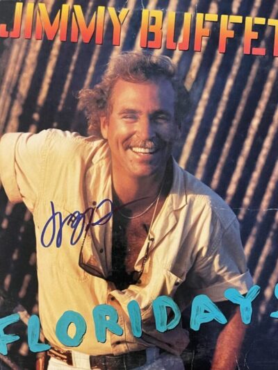 Album cover with smiling man and text.