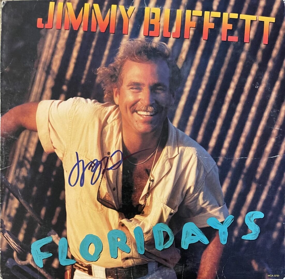 Album cover with smiling man and text.