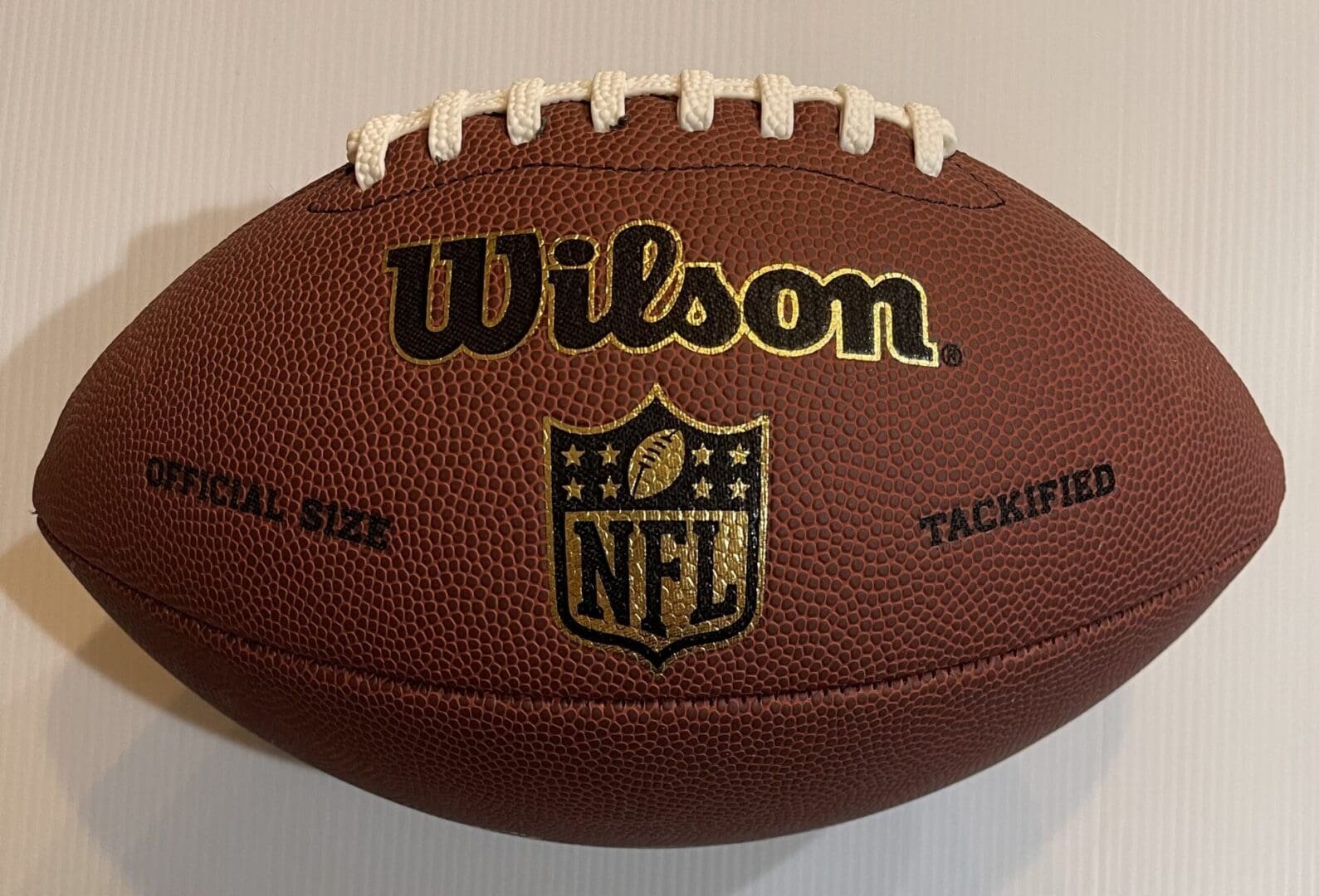 Wilson NFL football with white laces.