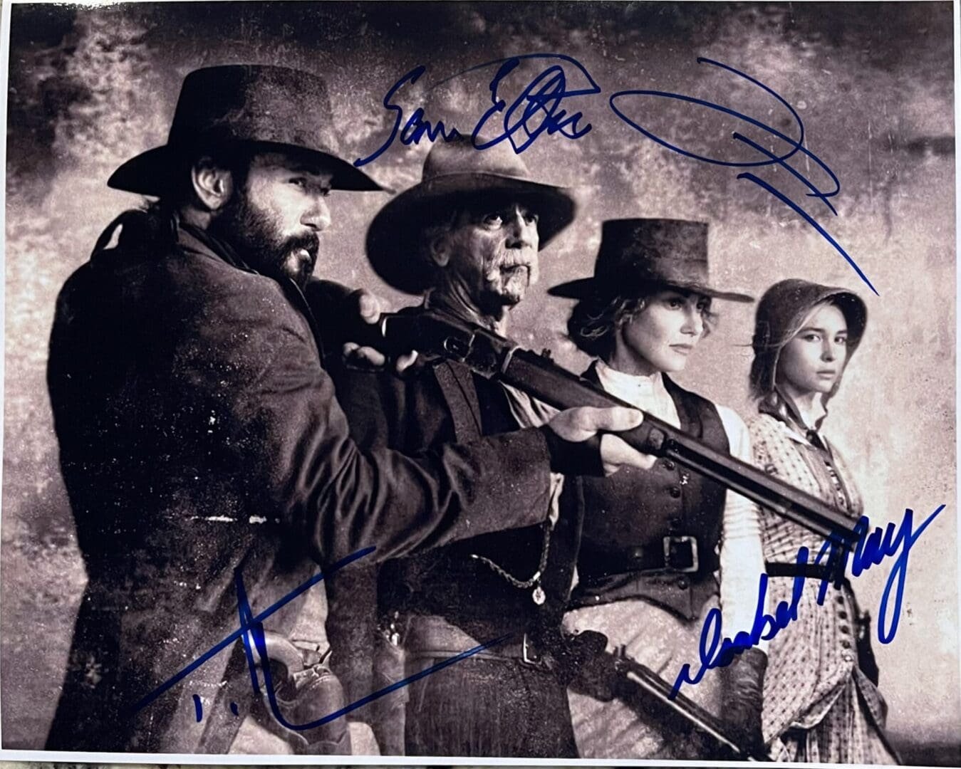 Four people in Western-style clothing