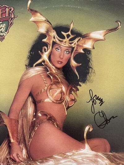 Woman in elaborate golden fantasy costume.