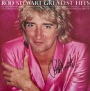 Album cover with person wearing pink jacket.
