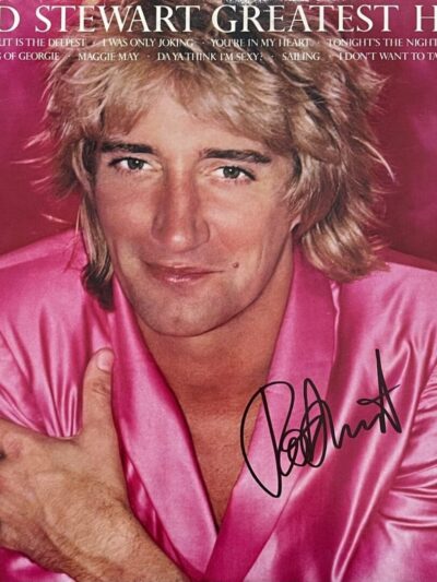 Album cover with person wearing pink jacket.
