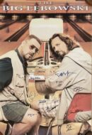 Two men seated in a bowling alley.