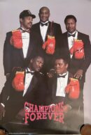 Five men in tuxedos holding boxing gloves.
