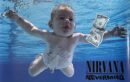 Baby swimming underwater towards dollar bill.