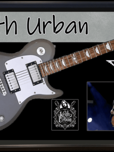 Guitar collage featuring Keith Urban signature.