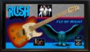 Framed Rush memorabilia with guitar and owl.