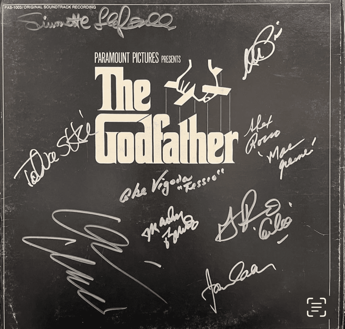 The Godfather album cover with signatures.