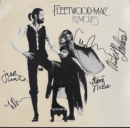 Fleetwood Mac "Rumours" album cover with signatures.