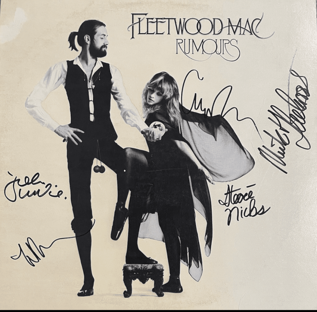 Fleetwood Mac "Rumours" album cover with signatures.