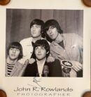 Four men posing for a vintage portrait.