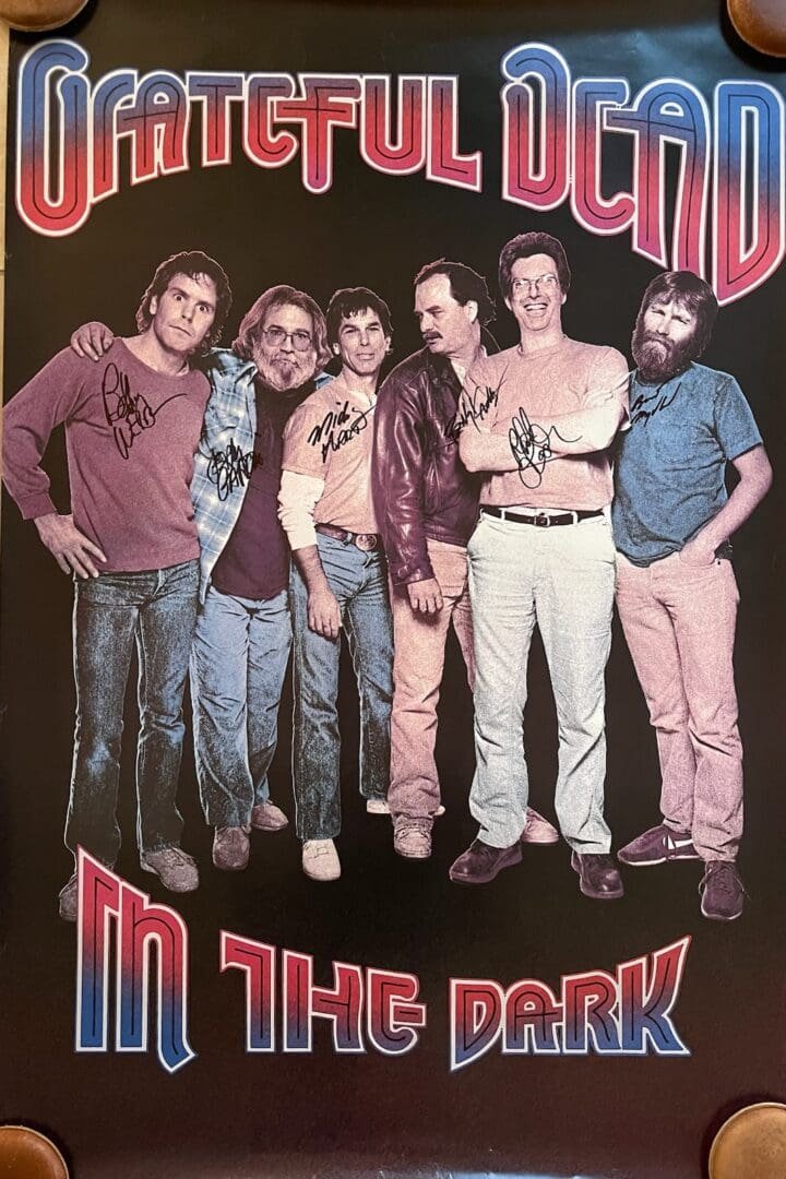Band members in "In the Dark" poster.