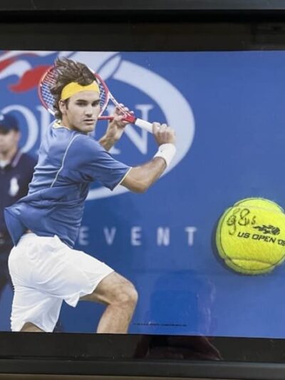 Tennis player hitting ball at US Open.