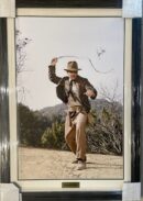 Man in hat with whip