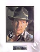 Man in fedora with intense expression.